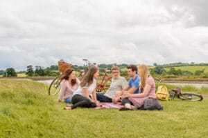 Friends sat with bikes