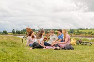 Friends sat with bikes